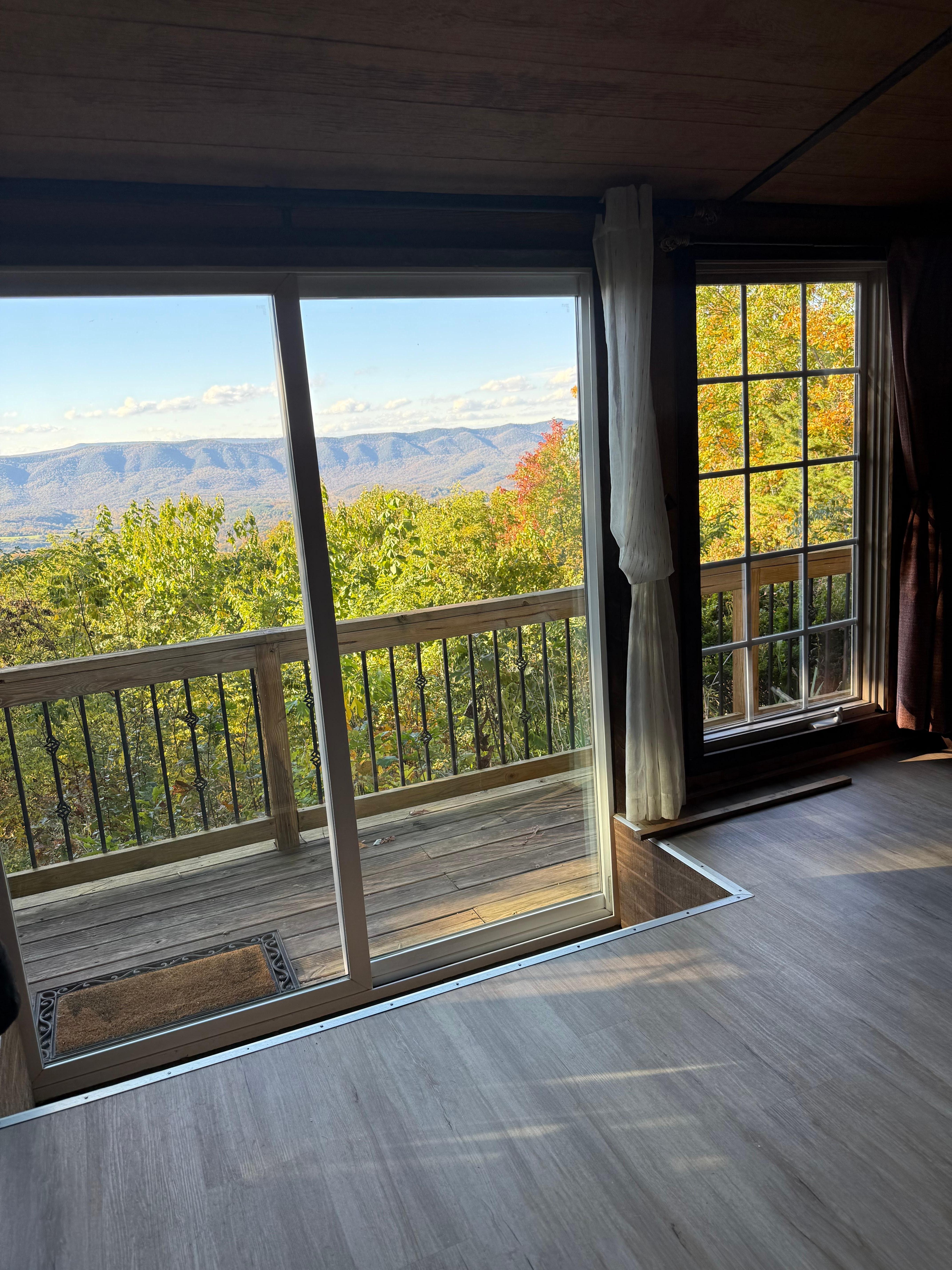 View looking out sliders from cabin