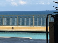 View of the ocean and pool at the hotel.