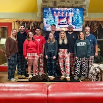 Family photo in living room.