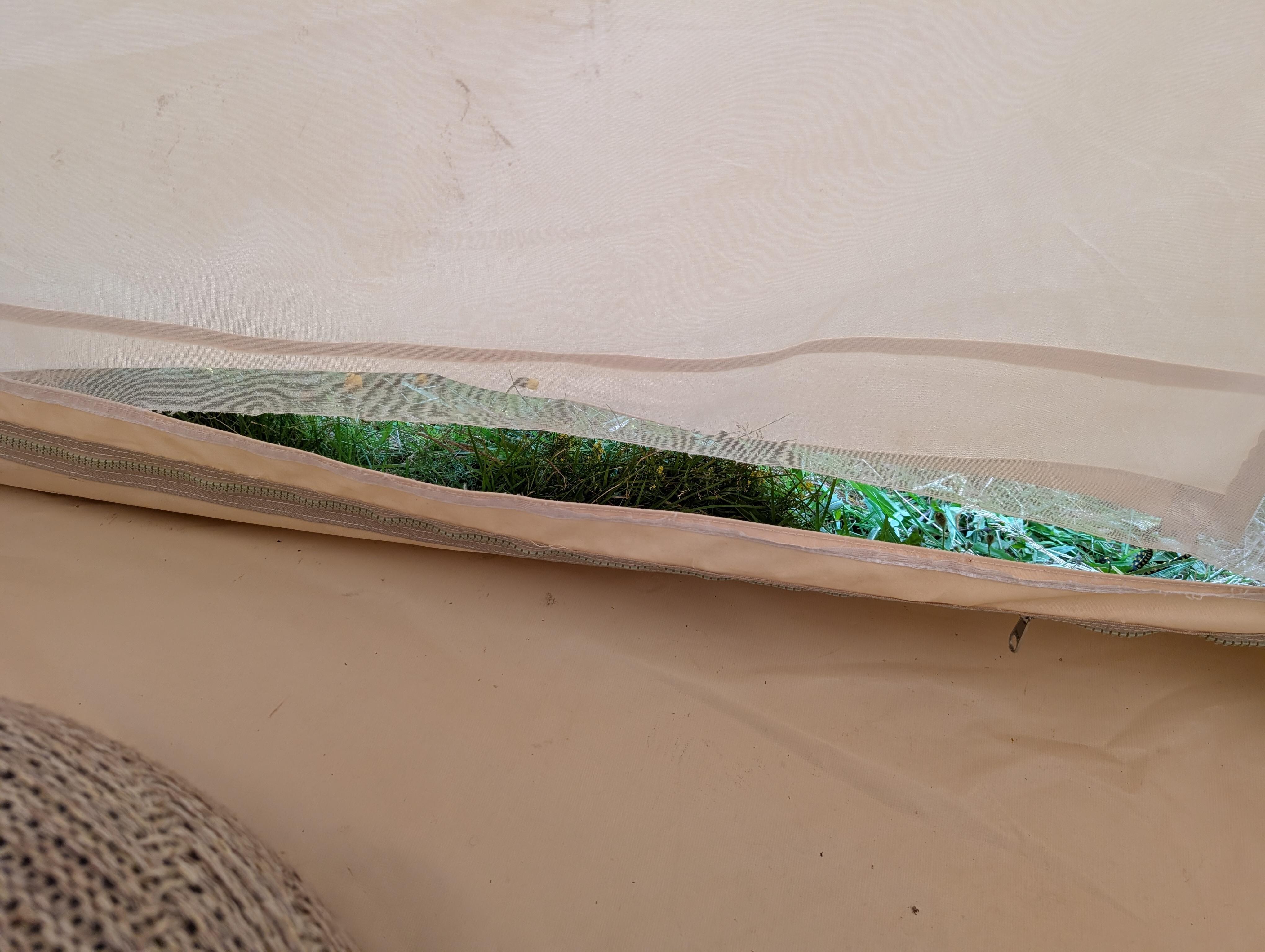 The tent entrances have two layers (screen and mesh layers), the inside mesh had a 2 foot rip .