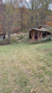 Hobbithenge and outhouse.