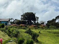 view from lower part of the property near the lake back up towards the rooms