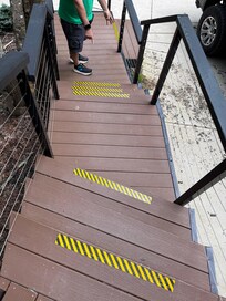 Multiple steps with warning tape that you don’t see in the advertisement.