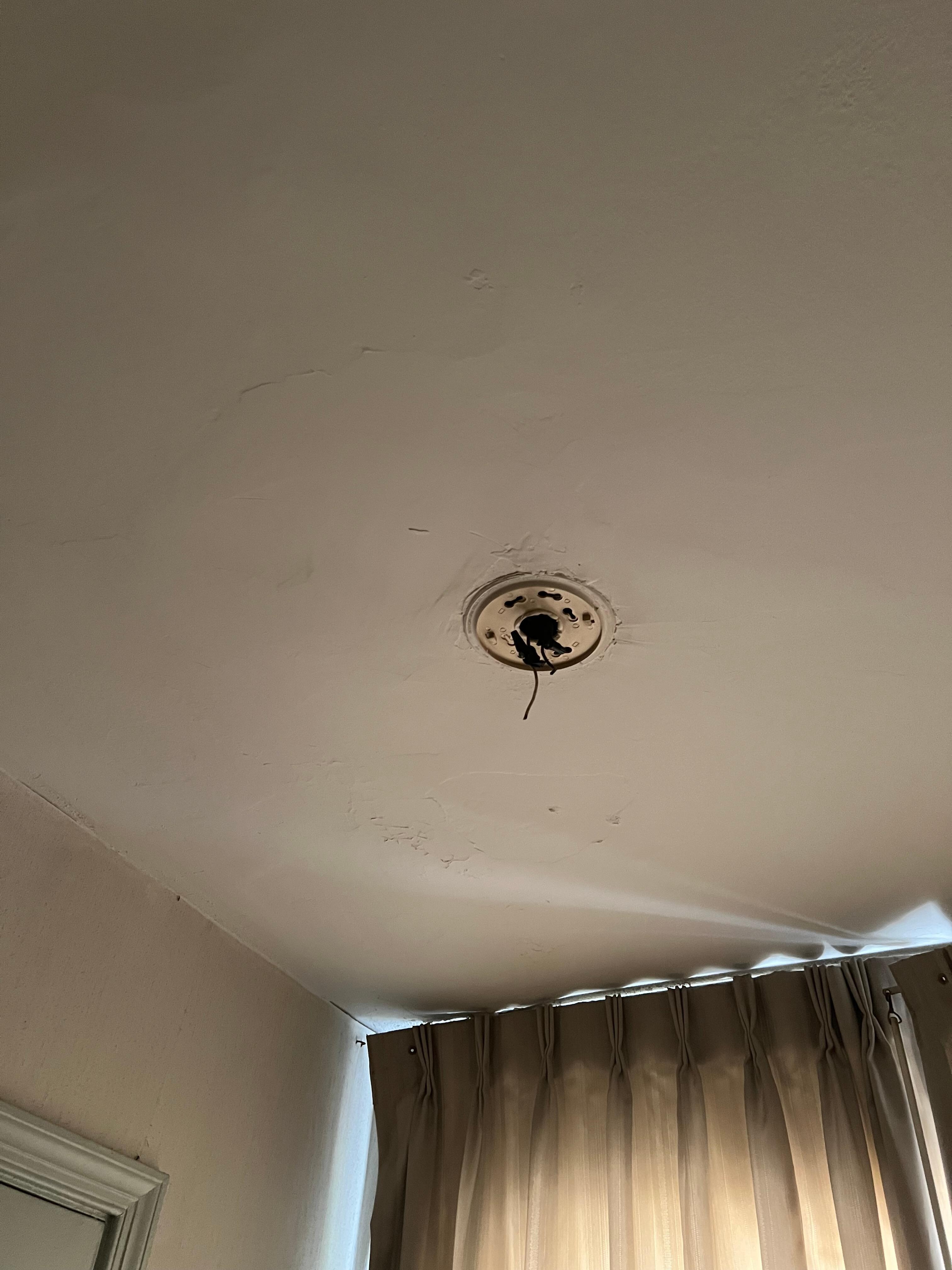 Bare wires where smoke detector should be