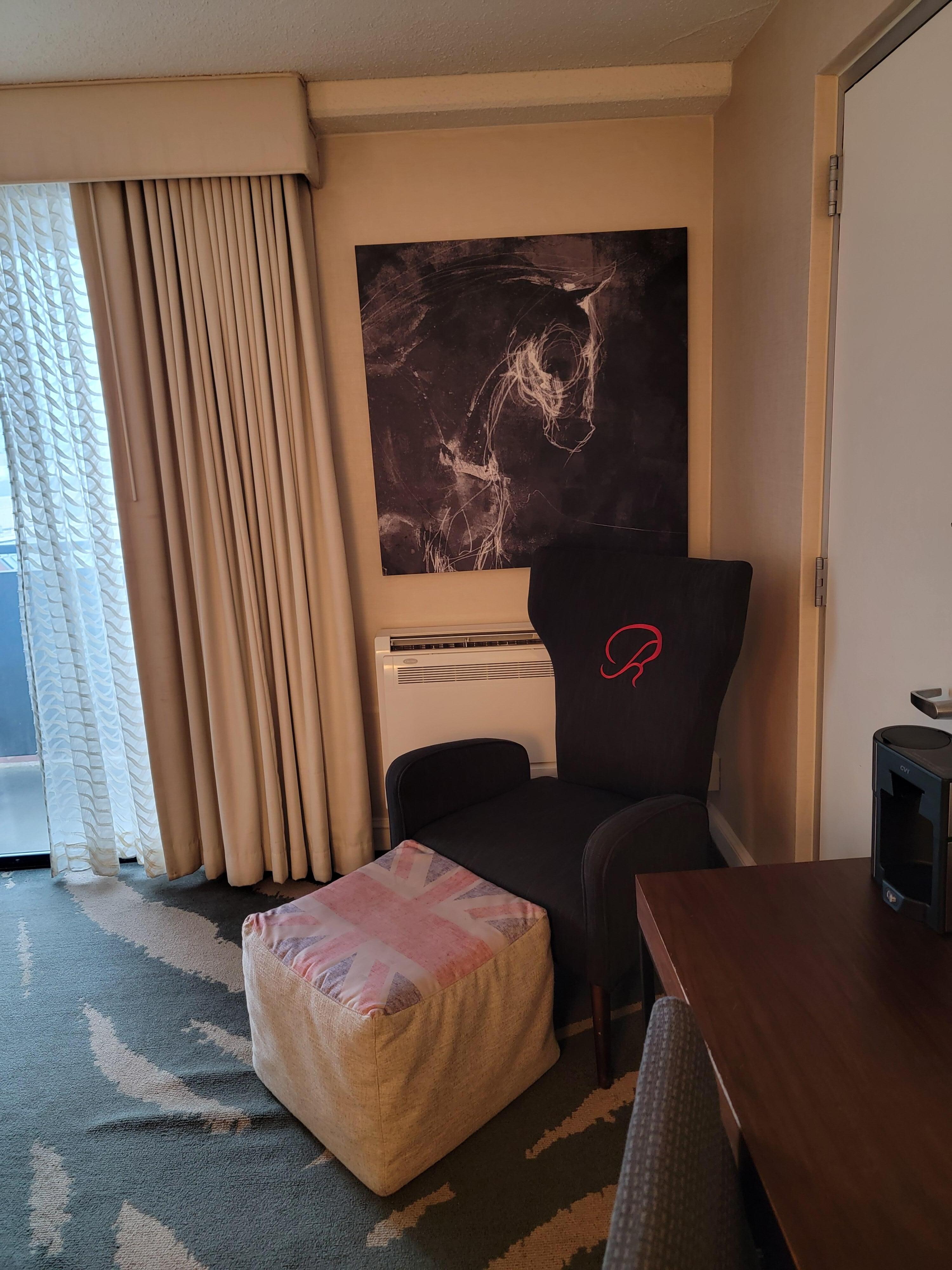 Chair in sitting area of suite