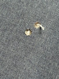 Cigarette holes in the couch
