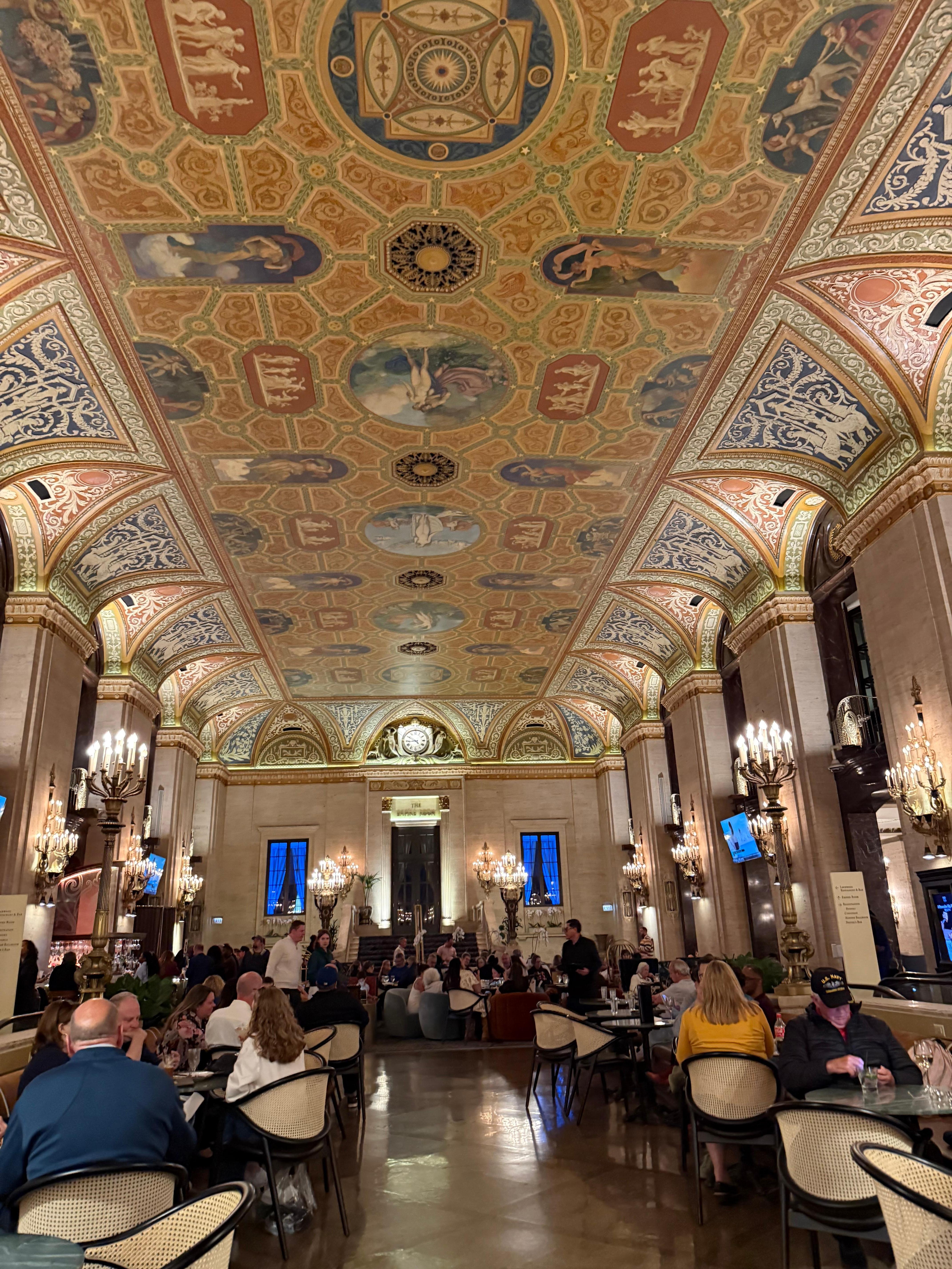 Beautiful ceiling accents the dining area! 