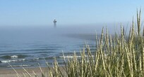 The fog had rolled in on the Sodus Point Lighthouse the first morning we walked down to see it.