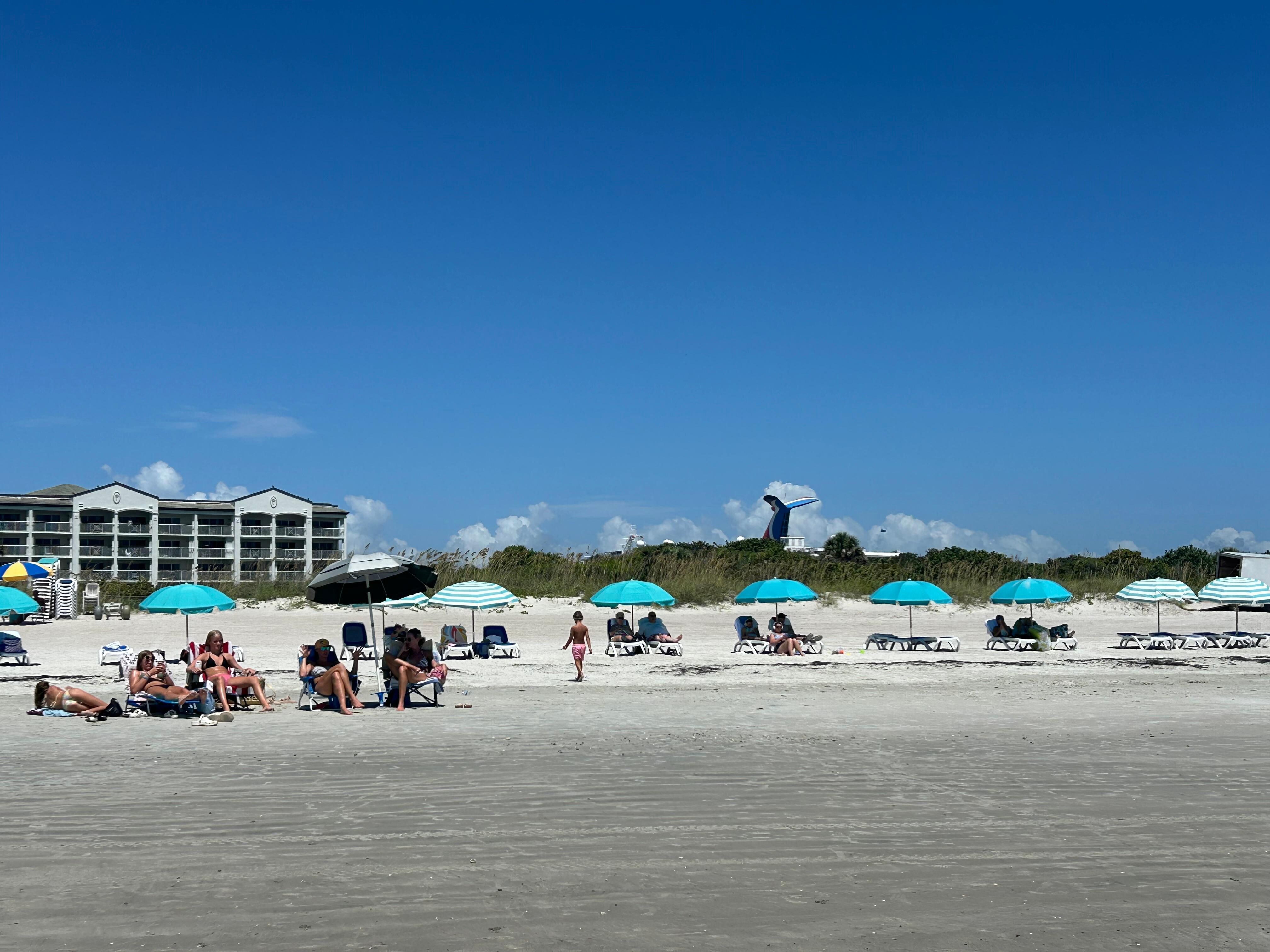 Building 2 - umbrellas and 2 lounge chairs available to rent for the day.