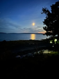 taken from the deck. Moon over the water