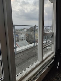 Public balcony right outside our room. Others guests could enter from behind the corner and come take selfies in the room balcony right next to our bed.