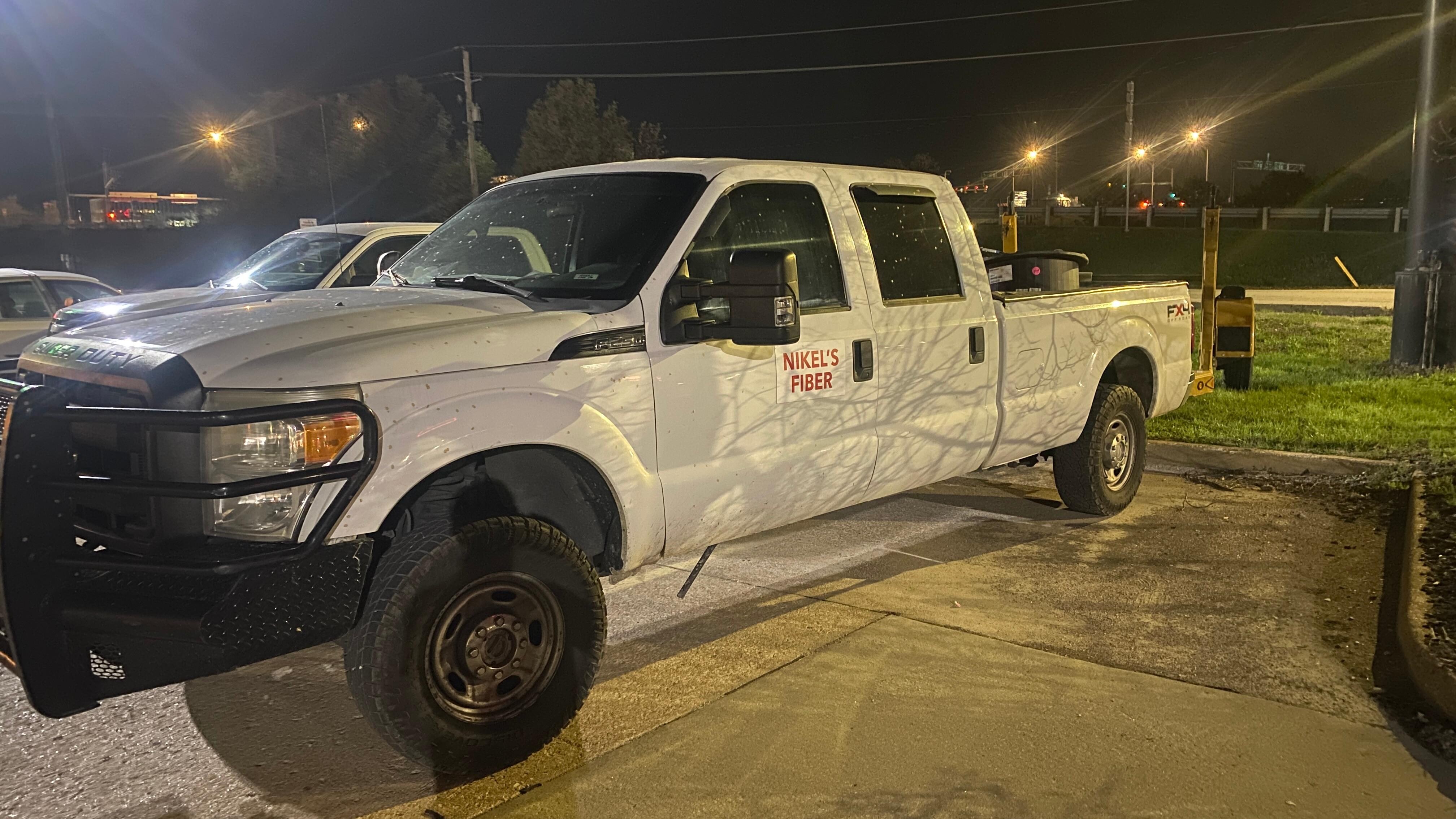 One large truck taking up 2 spaces dedicated for passenger vehicles.  I don't consider a large commercial-use F-250 with crew cab as a normal passenger vehicle.