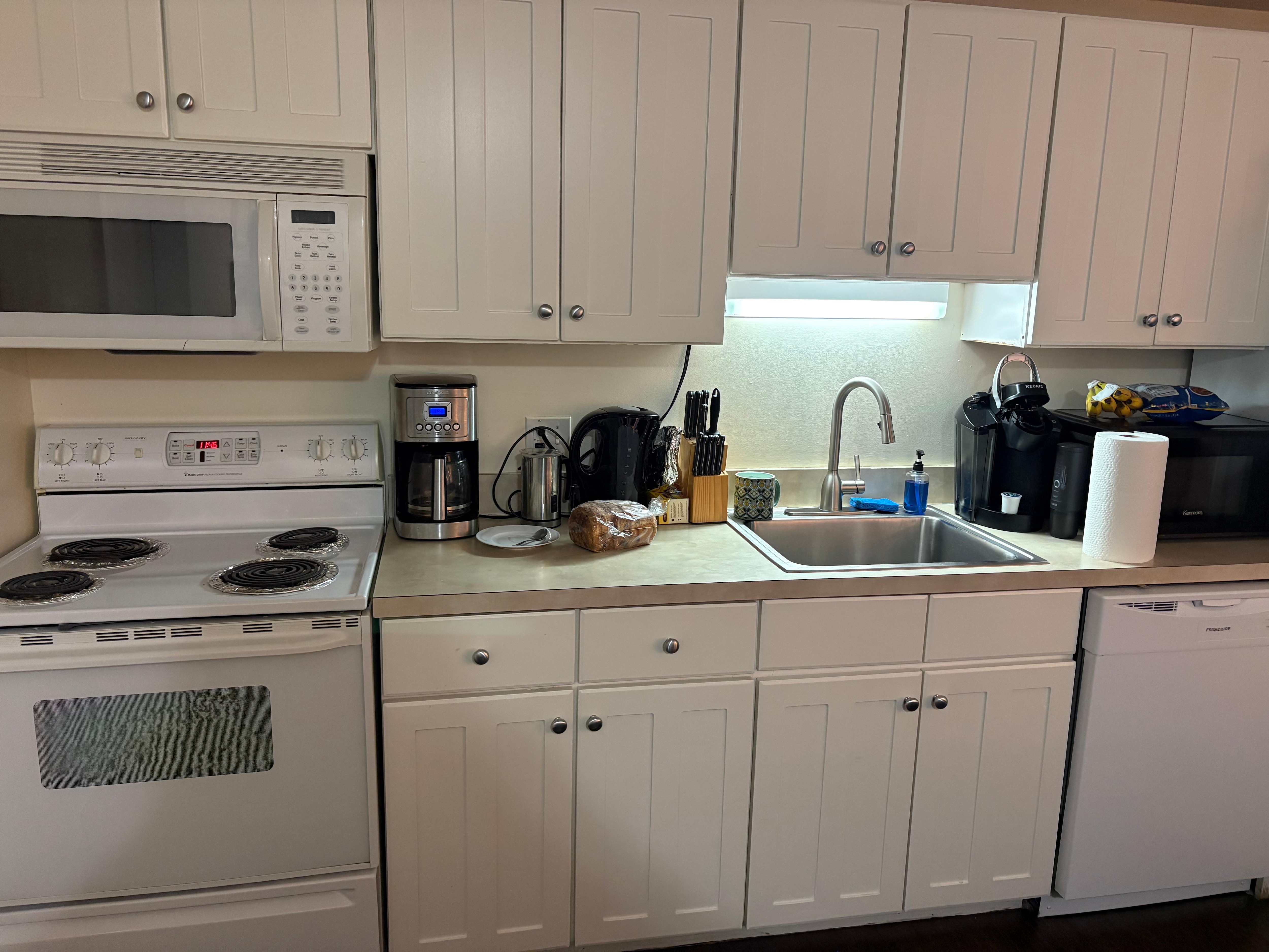 The only light in kitchen was above the sink. 