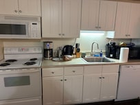 The only light in kitchen was above the sink.