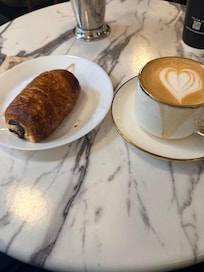 Cute little French cafe in hotel! BUSY!