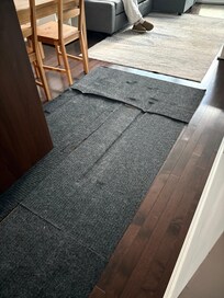 Missing kitchen floor boards Carpet covering
