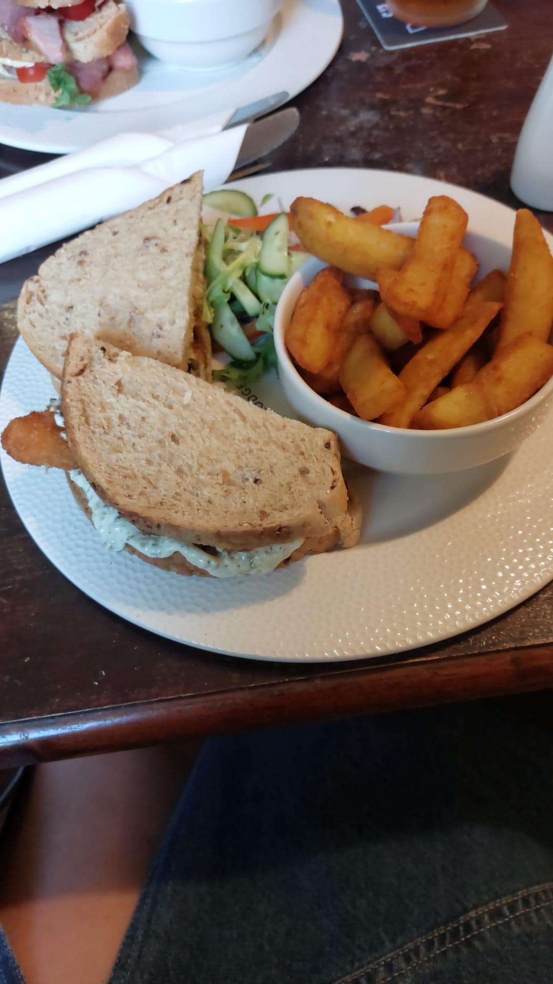 Bar snack homemade fish finger and tartaric sauce sandwich