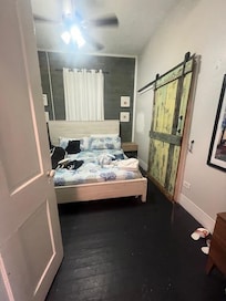 Master bedroom. Barn door leads to master bathroom, which is really nice.