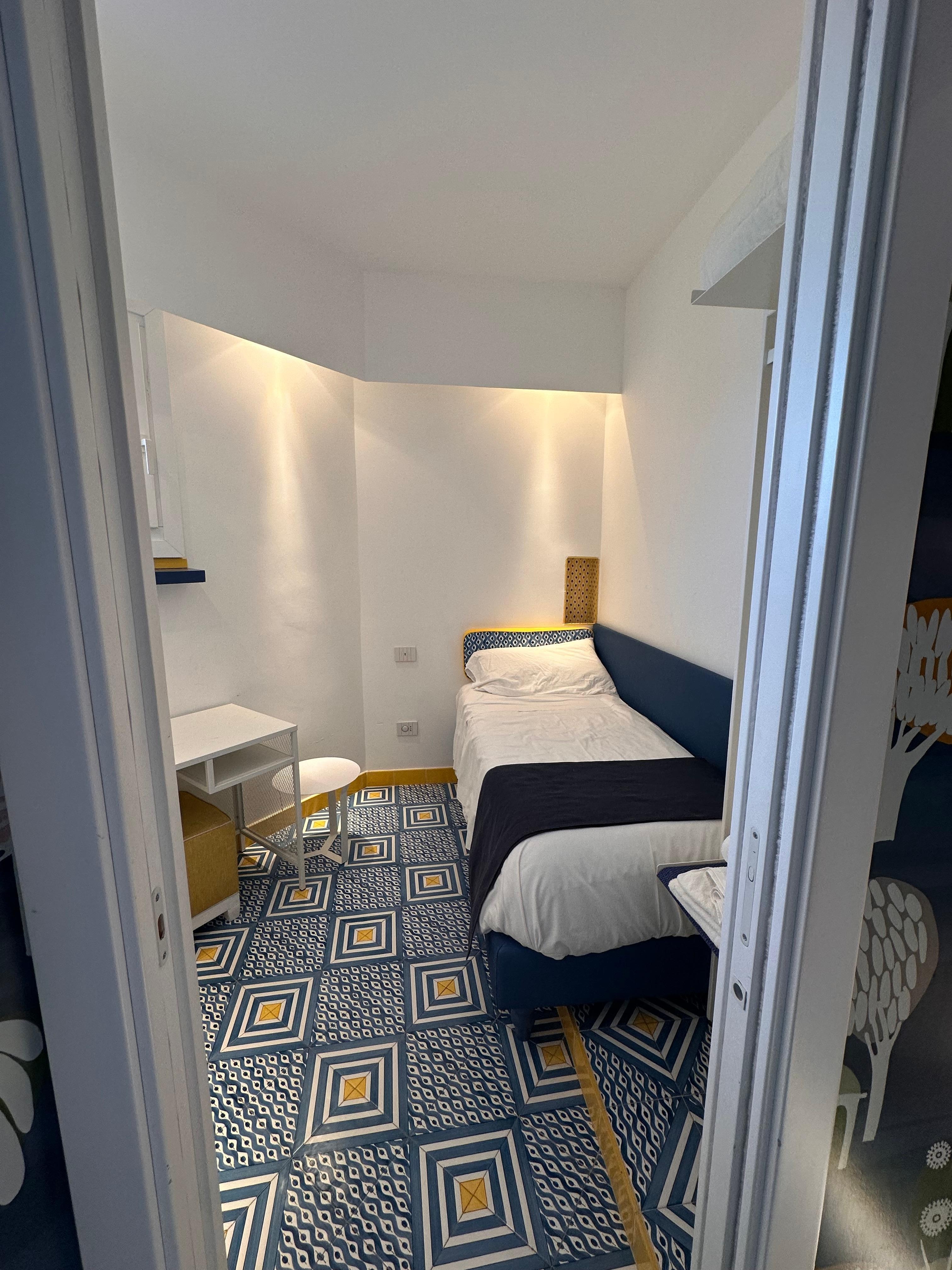 Small bedroom we used for our luggage and changing
