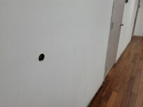 Holes in corridor walls 2nd floor