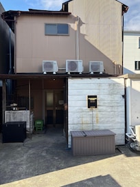 Front of hotel but can NOT be seen front street. It is the backside of building