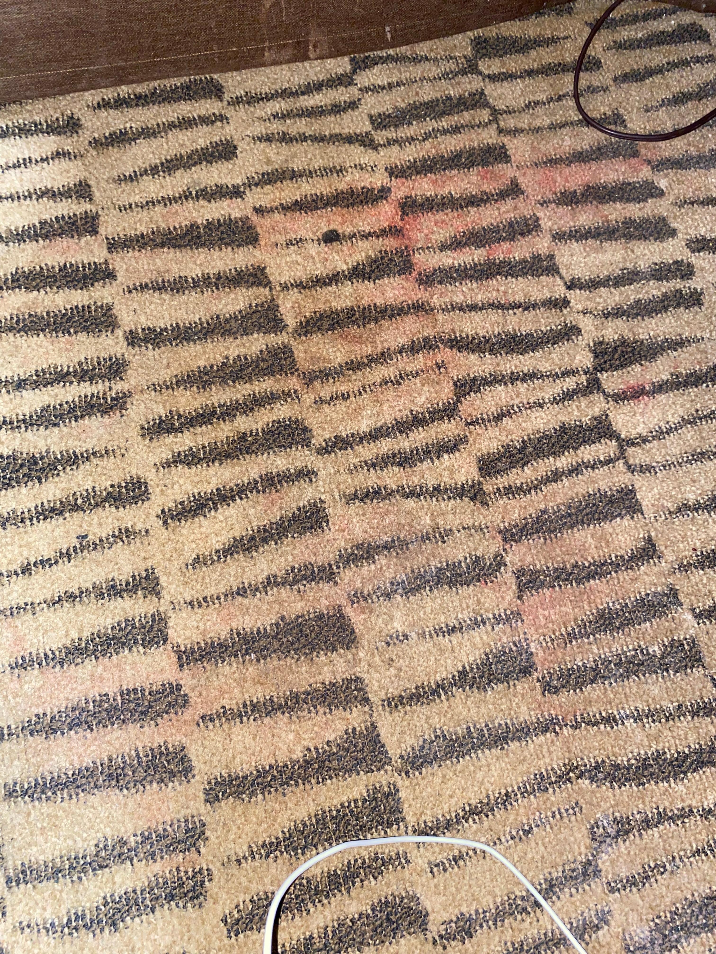 Red stains from something that was spilled 