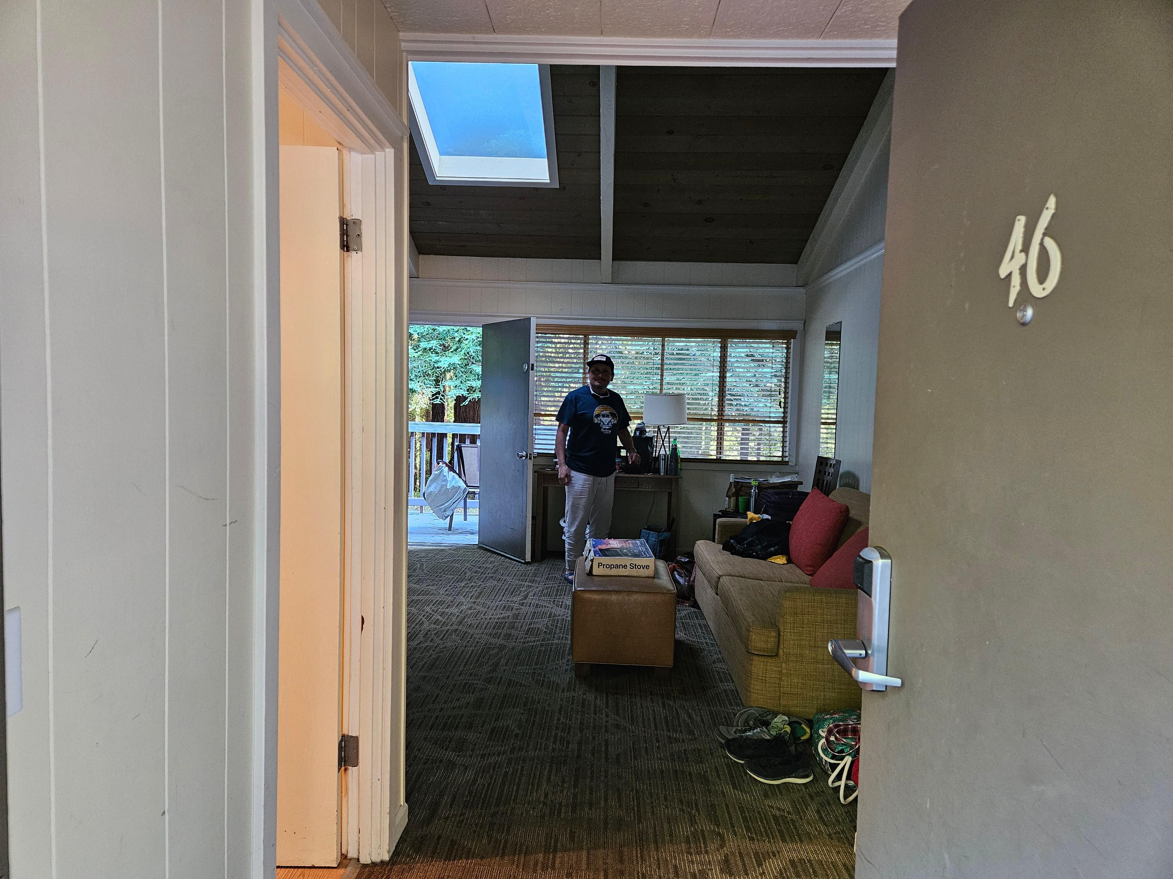 Great room with back door and deck, skylight