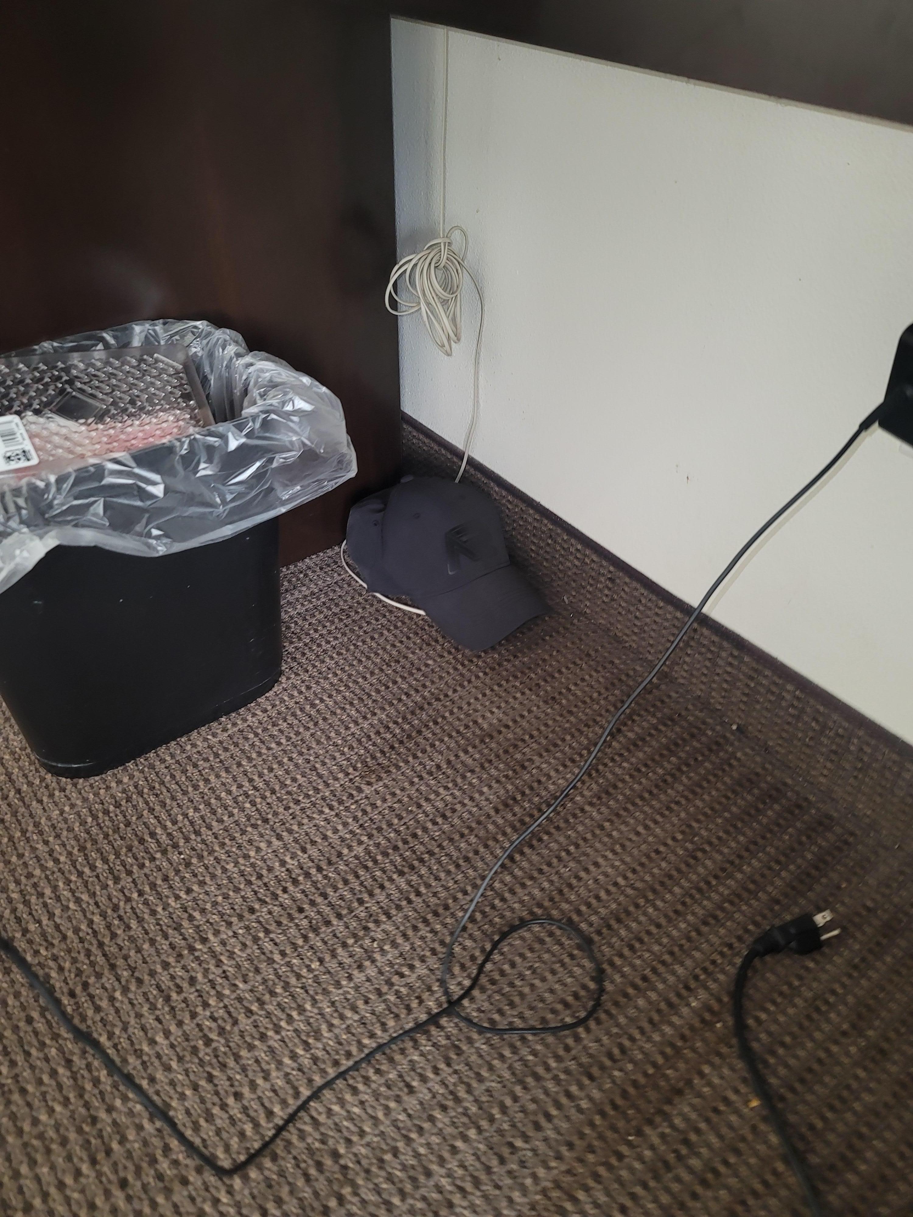 Hat left under desk from room just not being cleaned good