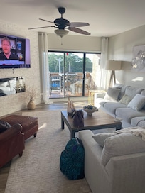 Family room is beautiful and inviting, very cozy.