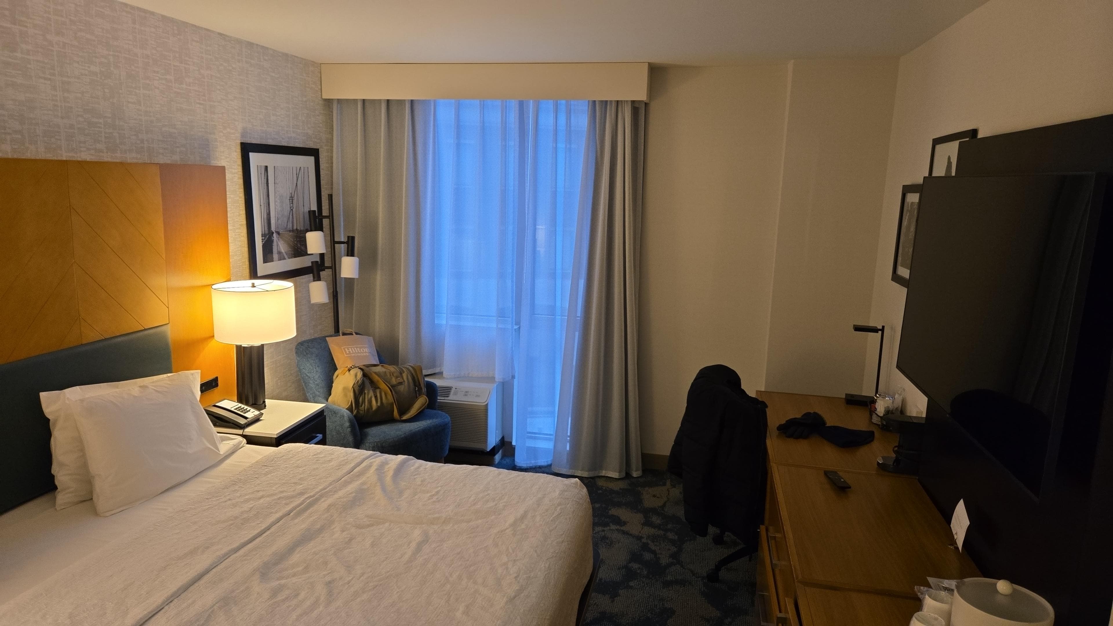 King sized bed with view of the Main Avenues.