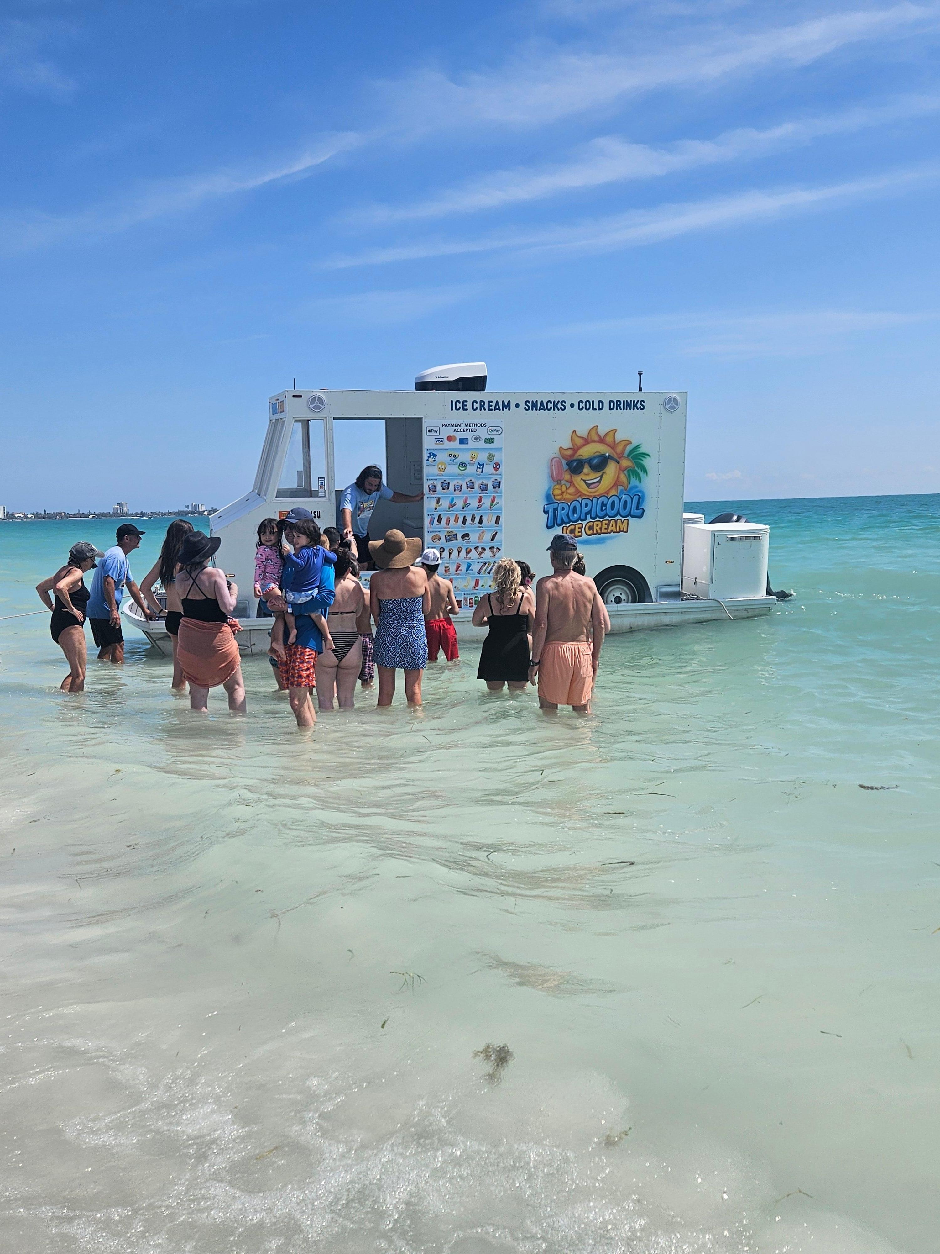Ice cream truck at the ocean.