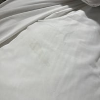 Stains on the sheets.