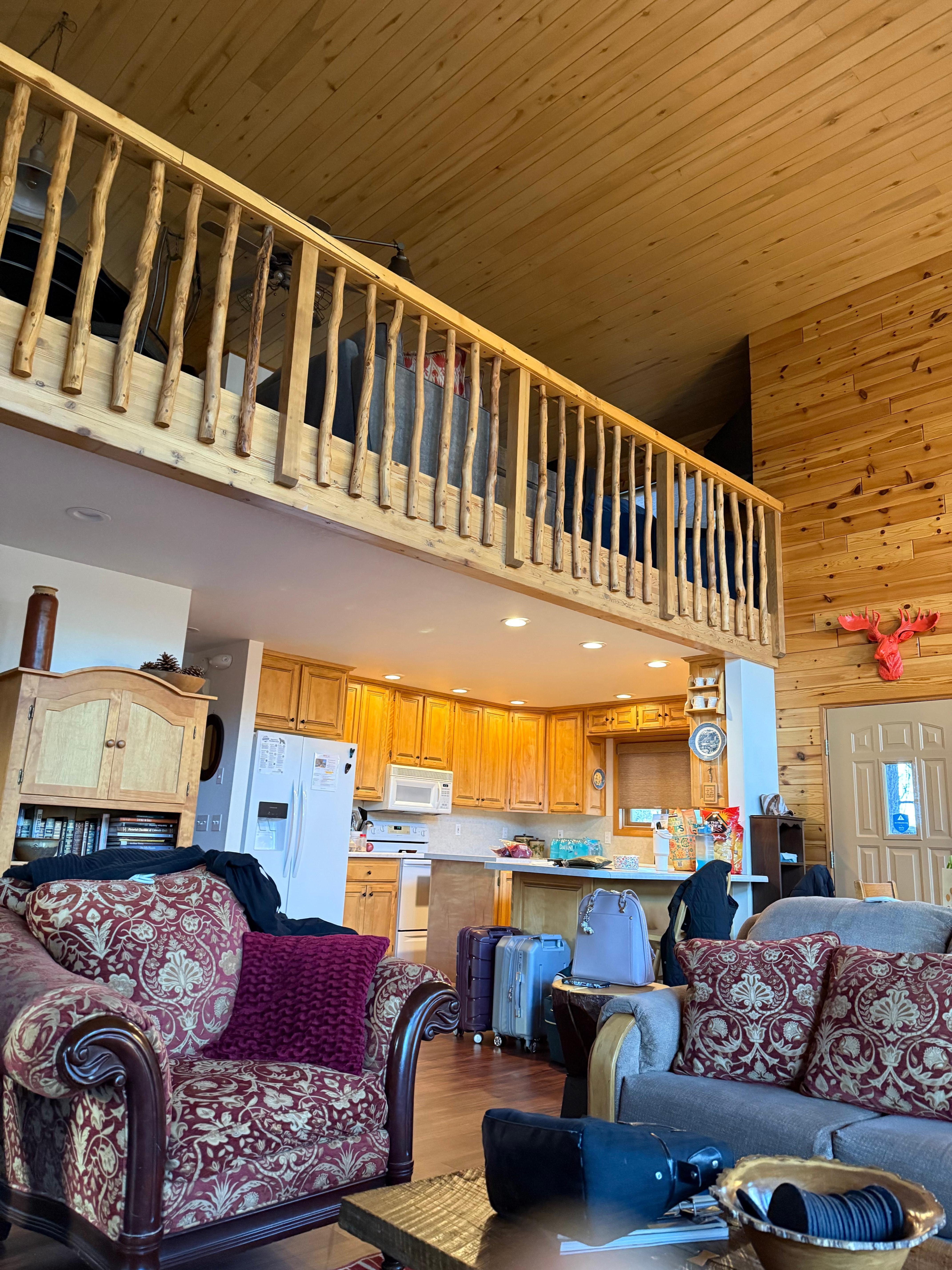 Lower level of cabinet looking toward loft/gaming area. April 2026. 