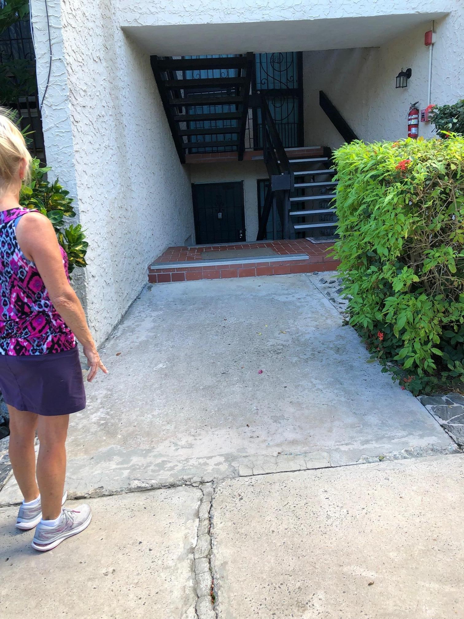Looking down at the condo from ground level side walk.