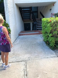Looking down at the condo from ground level side walk.