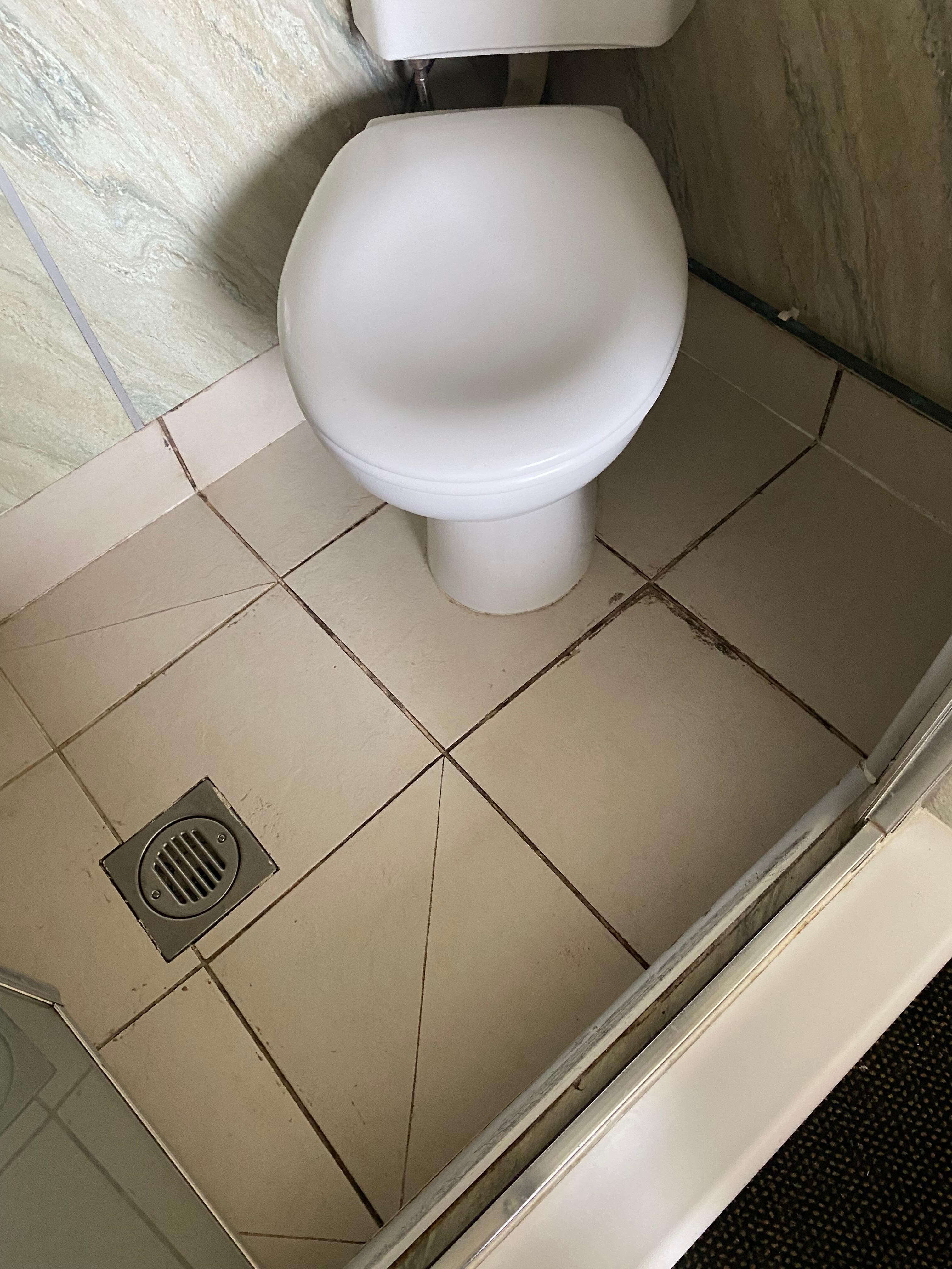 Filthy cracked floor. Source of cross contamination 