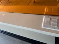 Burn marks all over in the room. Mirror in the background is tinted yellow for some reason