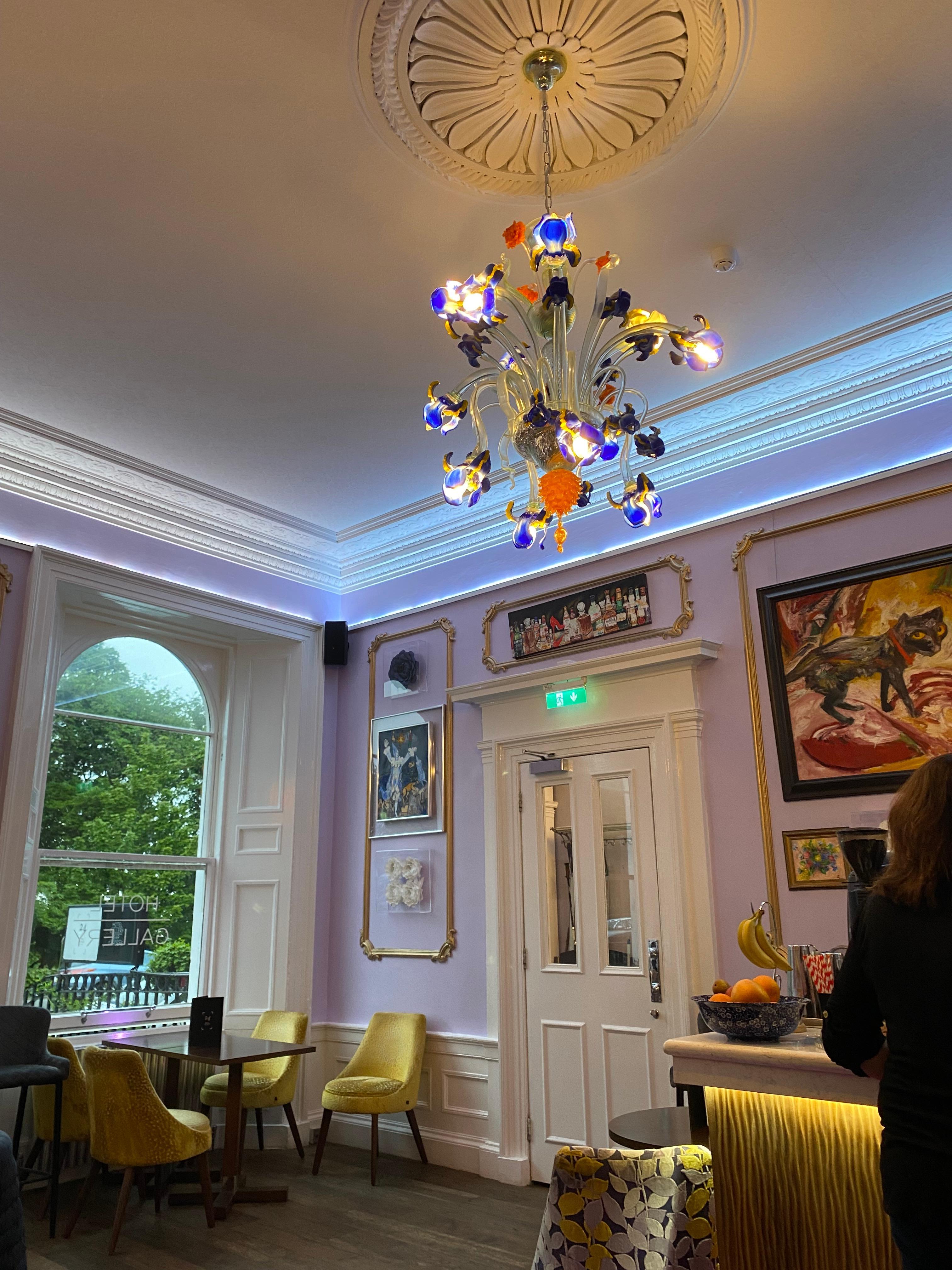 Beautiful light fitting in the colourful bar/breakfast room.