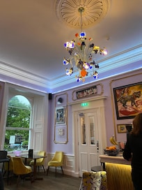 Beautiful light fitting in the colourful bar/breakfast room.