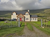 Front of the house with Mount Brandon behind it in the clouds. Beautiful!!