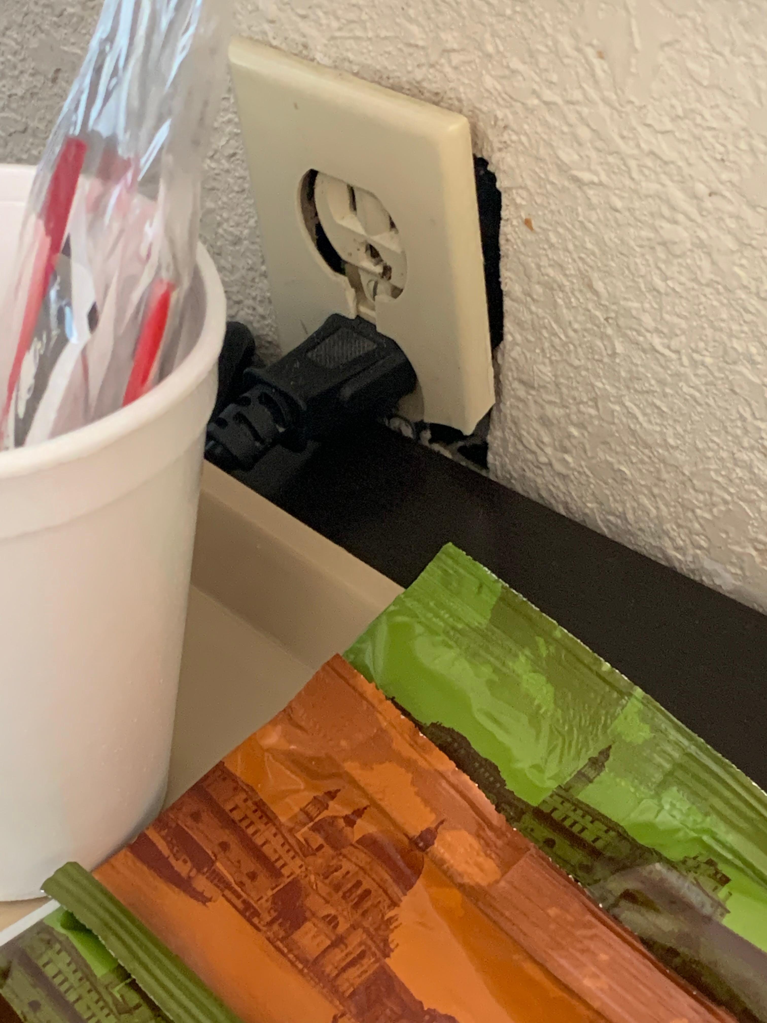 Broken outlet cover a throughway for bugs