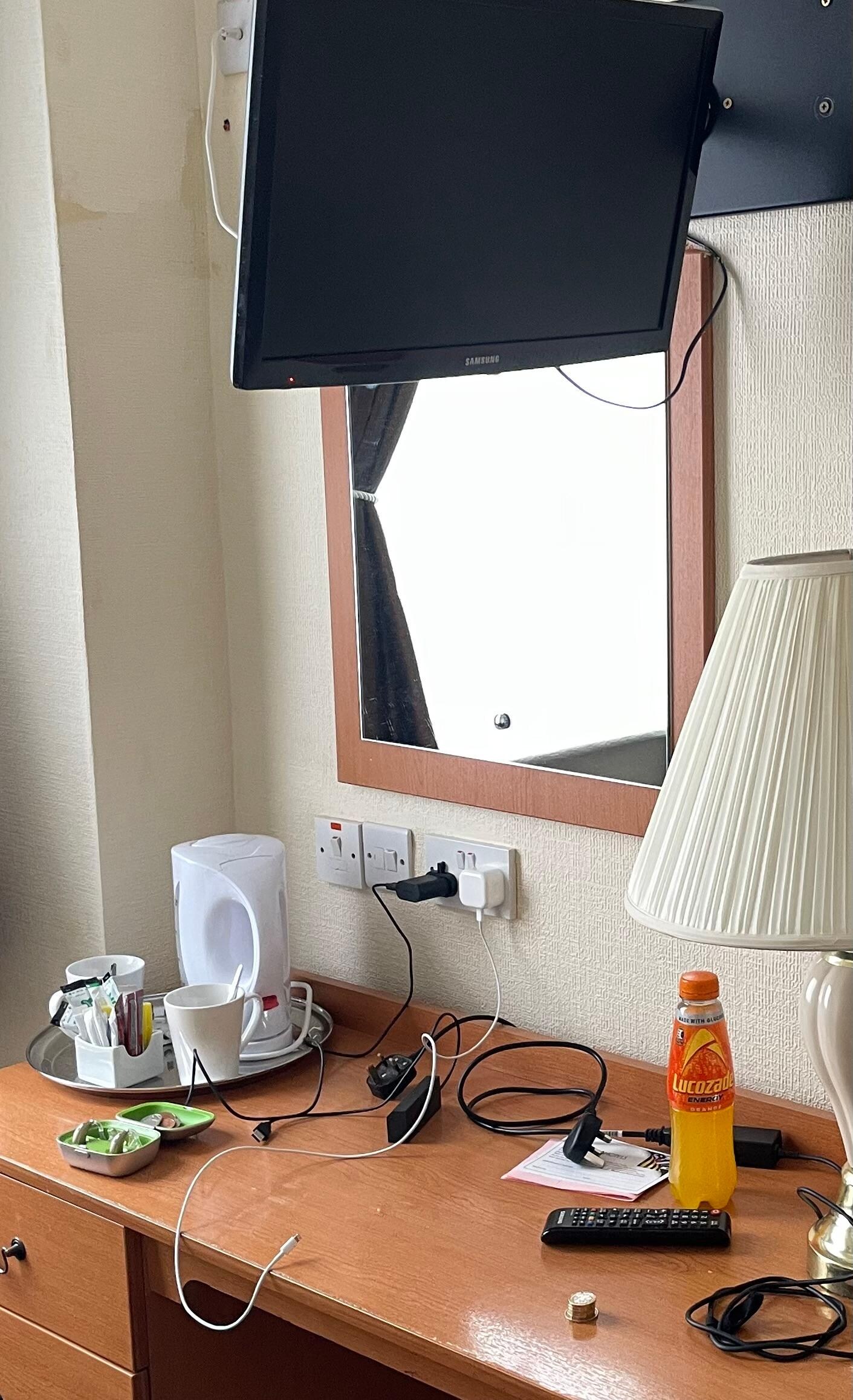 TV over middle of dresser so you bang your head when standing up