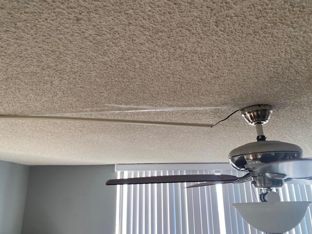 Wiring hanging from ceiling, Sparking when you turned ceiling fan on.