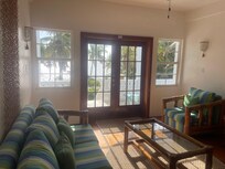 Upstairs sitting are with amazing veranda access