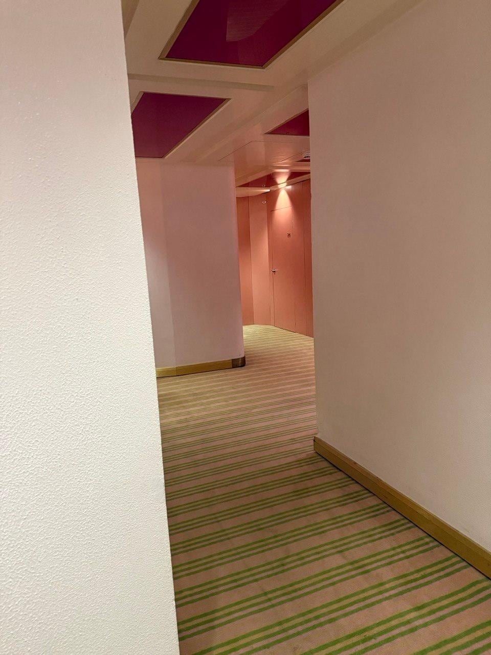 Hallway with orange doors