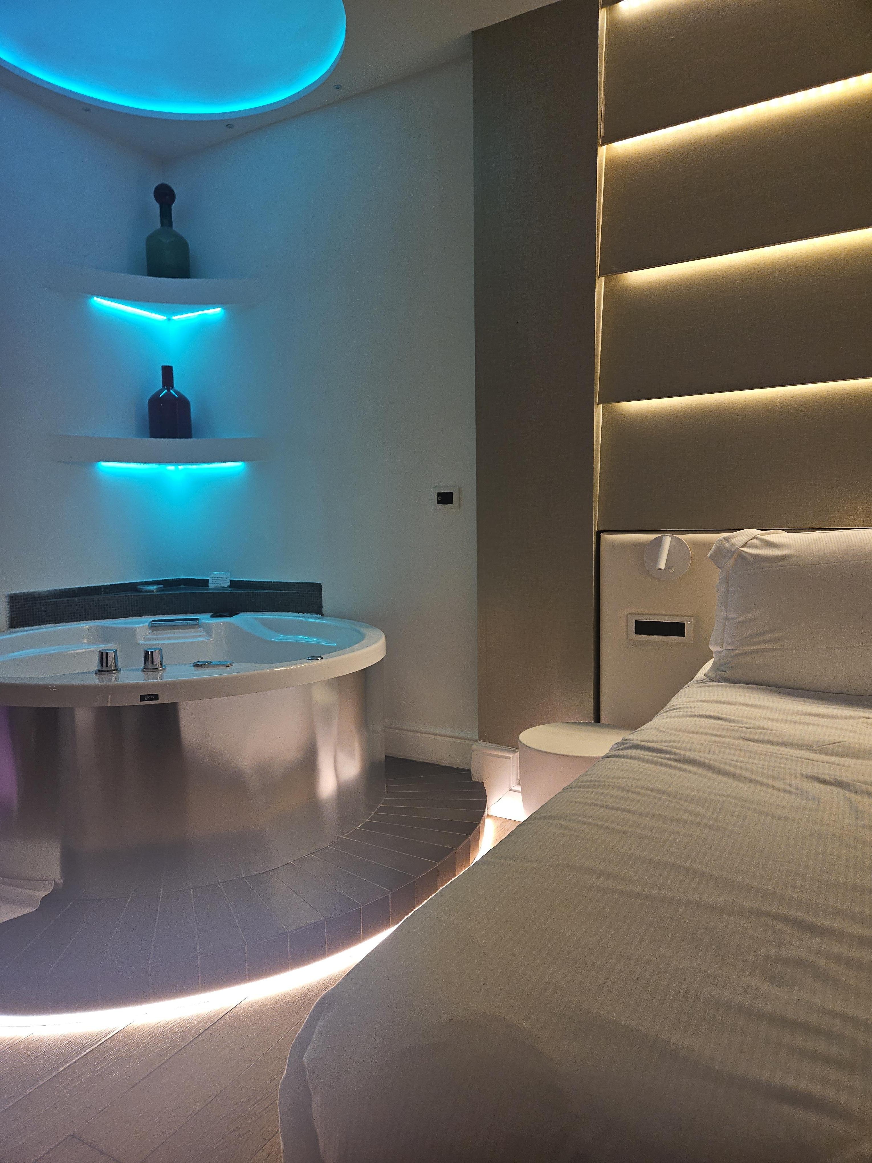 In suite jet tub for jr suite.  Seperate bathroom for shower.  Very tall 7 foot tall rain style.  Perfect for a tall visitor.