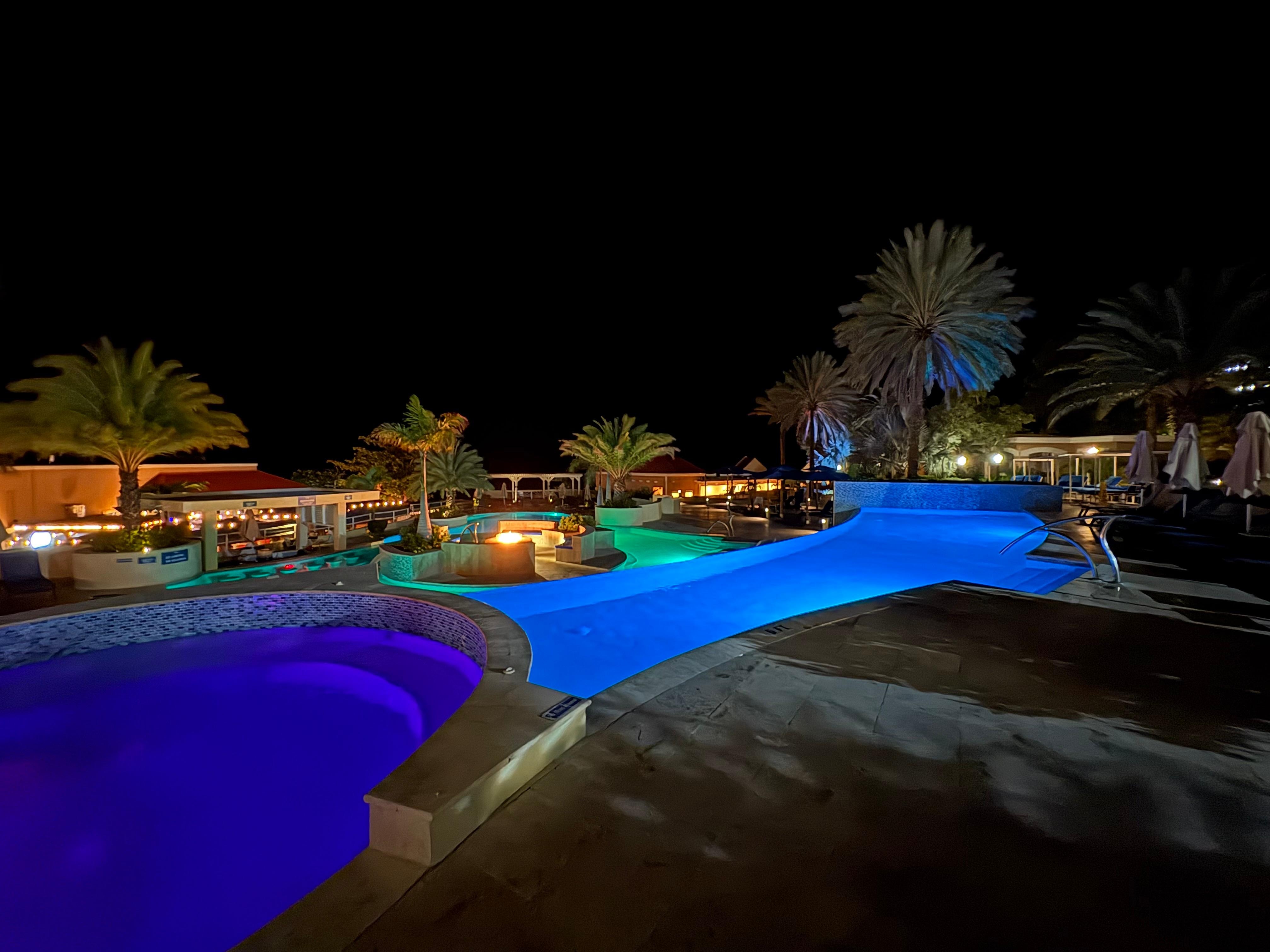 The pool area at night. 