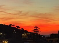 Watching the sunset from the balcony.