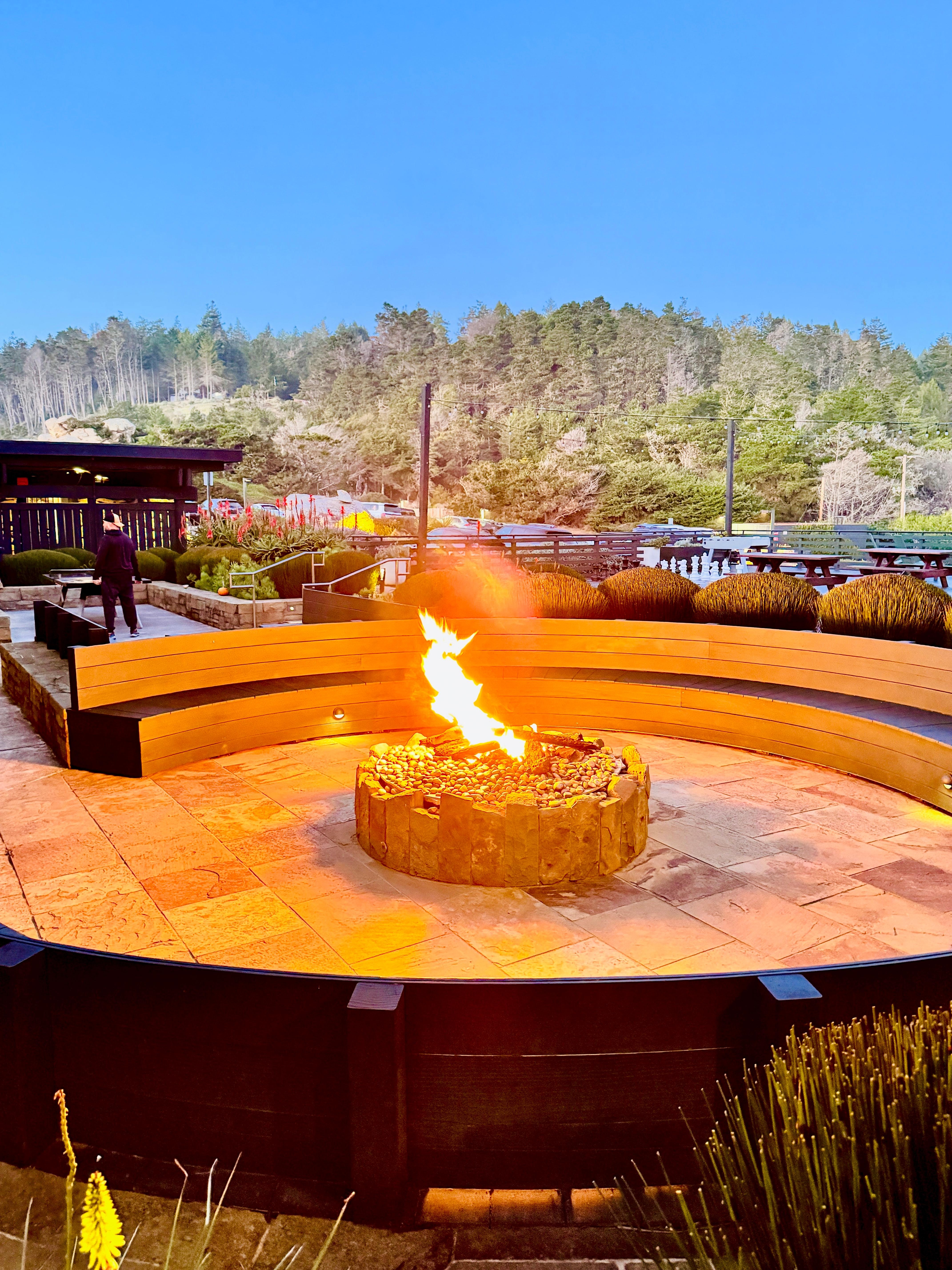 one of the many fire pit seating areas