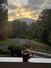 Our front porch coffee spot each morning!